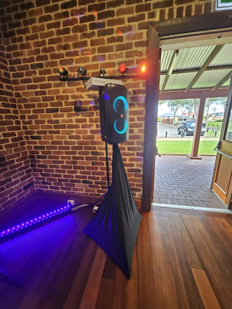 Party hire Perth — laser lights and disco lights transforming a backyard party