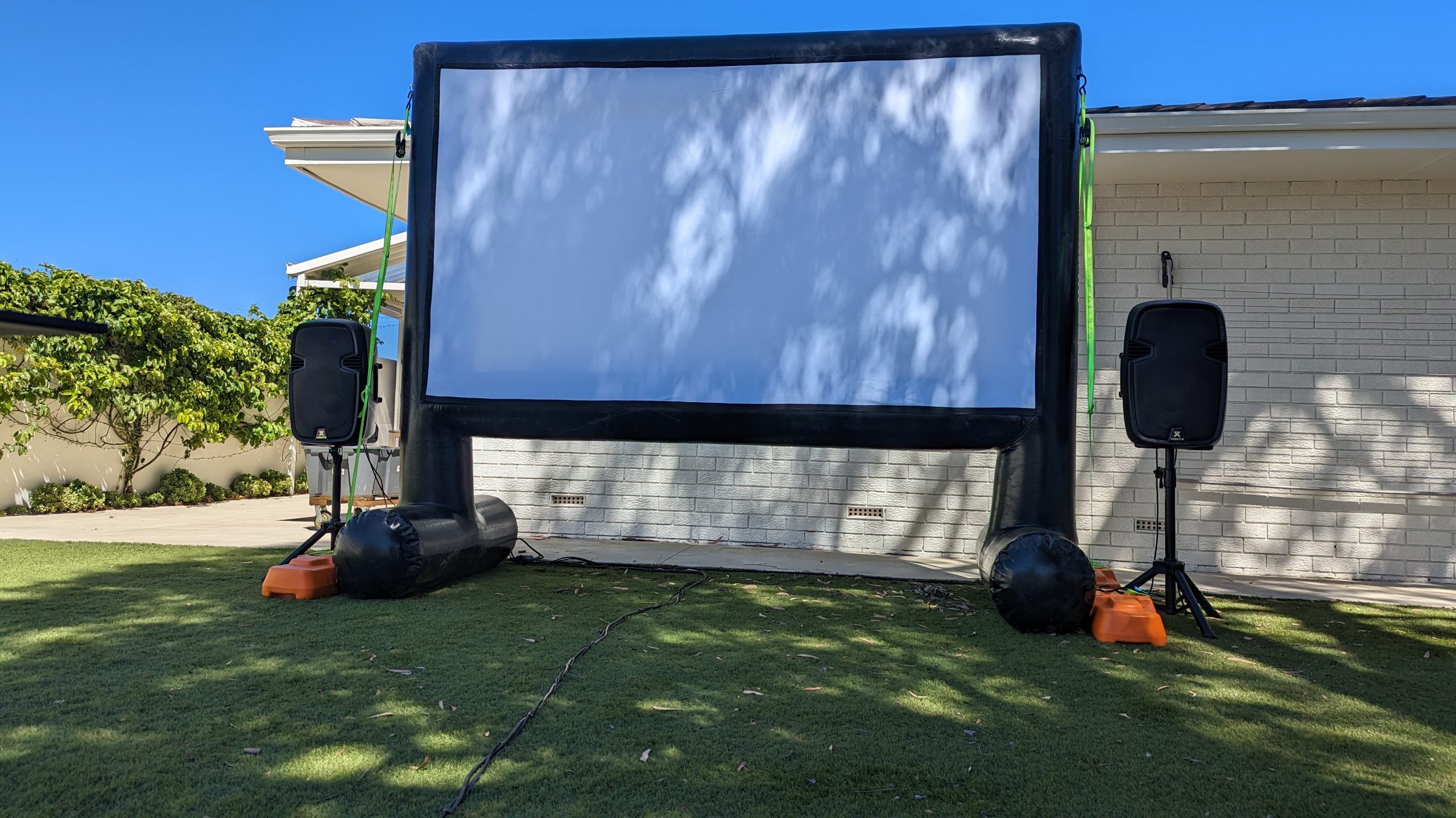 Outdoor movie night comfort Perth - guests relaxing at a professional cinema setup